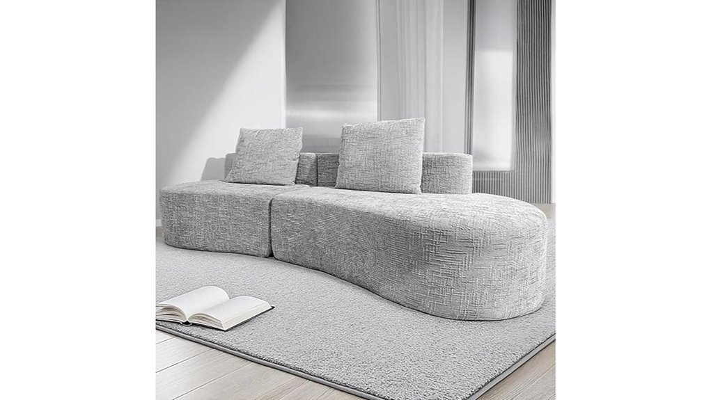 light grey curved sofa